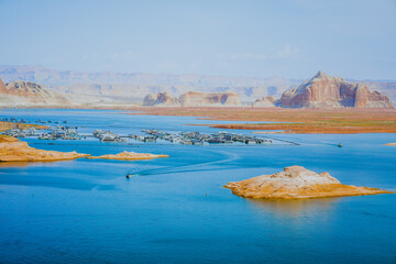 Lake Powell overlook. Morred boats, blue water, and red rocks, Utah