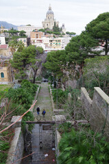 View of historic old backstreets, buildings and churches of downtown skyline of Messina, Sicily in...