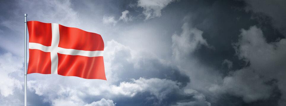 Danish flag on a cloudy sky