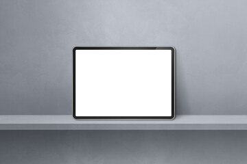 Digital tablet pc on grey wall shelf. Horizontal background banner