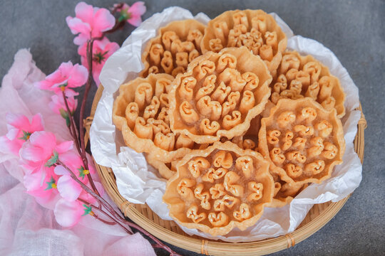 Typical Asian festive street food snacks for all races. CNY Honeycomb Cookies. A must have by multi races during festival celebrations.