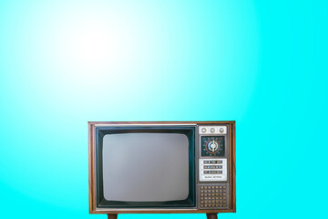 Vintage TV isolated on blue background .