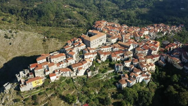 The traditional town center of Aieta on top of its cliff in Europe, Italy, Calabria in summer on a sunny day.