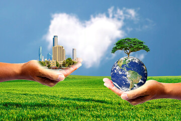 The left hand holds money. Right hand holding a earth There is a bokeh background. Design concept...