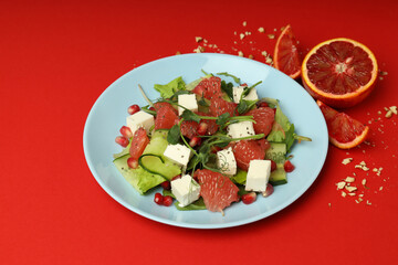 Concept of tasty food with salad with red orange