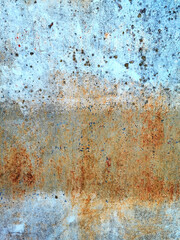 texture old blue painted metal plate nailed rusting and crumbling