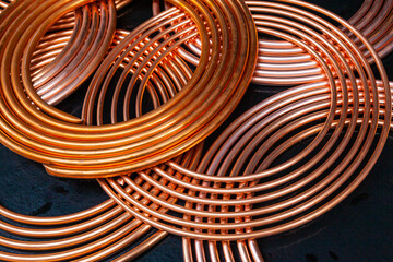 New copper twisted pipes of the same diameter.