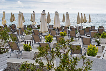 Equipped with sun loungers and umbrellas beach on the sea