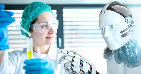 Forschung 4.0, eine Wissenschaftlerin arbeitet mit humanoidem Roboter zusammen - obrazy, fototapety, plakaty