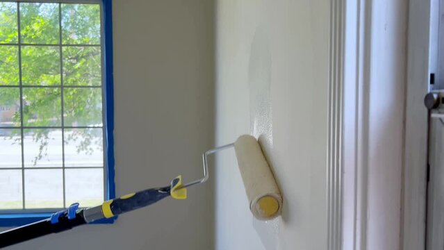 Nothing Like a A Fresh Coat, Painting a Bright Room with White Paint Using Paint Roller