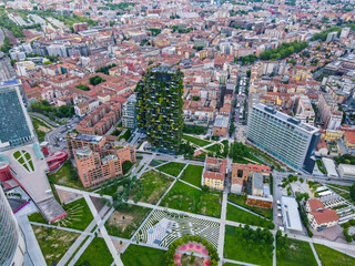 Aerial view of Milan Porta Nuova district, city skyline, business buildings and skyscrapers of Palazzo Regione Lombardia, Unicredit Tower, Bosco Verticale in Lombardy.