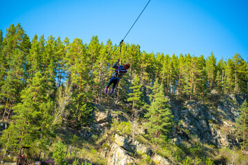 Kamysh waterfall in the Altai Republic, viewing platforms and a platform for descent on a cable...