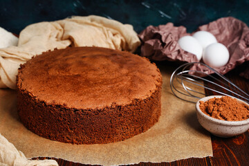Preparing and baking a homemade chocolate sponge biscuit cake. Cooking homemade cake. Home confectionery.