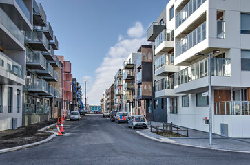 Reykjavik, Iceland, April 25, 2022: street with almost or recently completed buildings in a new...