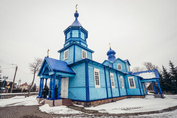 Side view of Exaltation of Holy Cross orthodox church in Narew village, Podlasie region, Poland