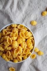 Dry Organic Gnocchi Pasta in a Bowl, top view. Flat lay, overhead, from above. Copy space.