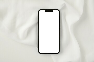 Smartphone mockup with empty screen on white silk fabric, phone mock up for digital card,...