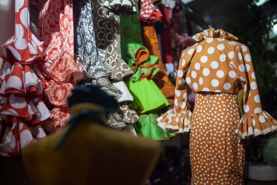 typical  flamenco spanish dress with polka dots on a mannequin