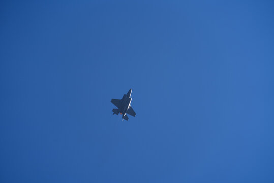 US fighter Lockheed Martin F-35 up in the sky at Swiss Air Force Airbase Emmen, Canton Lucerne, on a sunny spring noon. Photo taken March 23rd, 2022, Emmen, Switzerland.