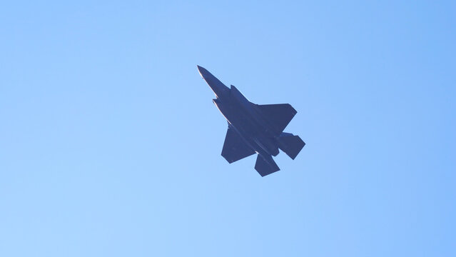 US fighter Lockheed Martin F-35 up in the sky at Swiss Air Force Airbase Emmen, Canton Lucerne, on a sunny spring noon. Photo taken March 23rd, 2022, Emmen, Switzerland.