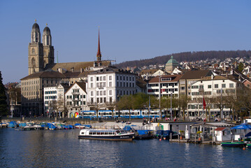 View over the medieval old town of Zürich with river Limmat and Protestant church Great Minster on a beautiful spring day. Photo taken March 28th, 2022, Zurich, Switzerland.