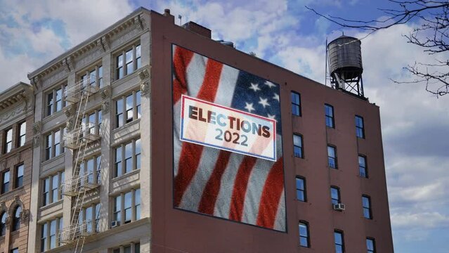 Building Outdoor Advertising Elections USA Led Panel Zoom In. 2022 American elections outdoor advertising on a building wall. Zoom in LED panel