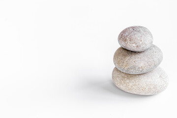 Fototapeta na wymiar Spa massage gray stones. Beauty treatment background