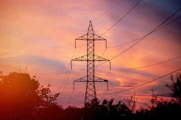 High voltage tower backlit . Energy concept