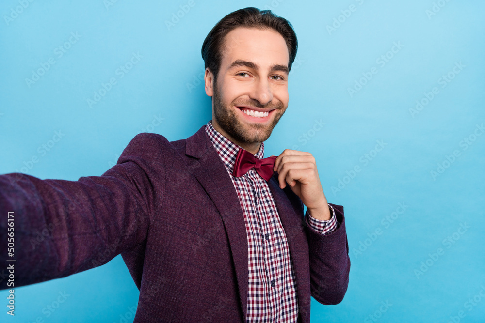 Sticker Photo of young handsome man shoot selfie prepare party event mister isolated over blue color background