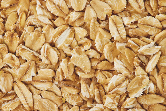 Macro image of raw oats cereal. Concept of healthy lifestyle. Natural food background.