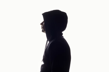 Man in Hood. Male silhouette portrait