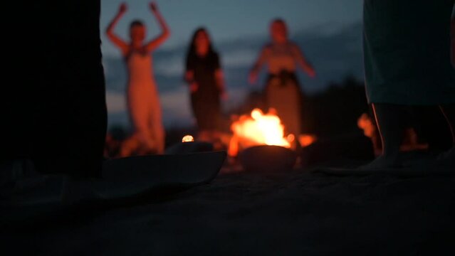 shamanic ritual dances of women at sunset by the campfire