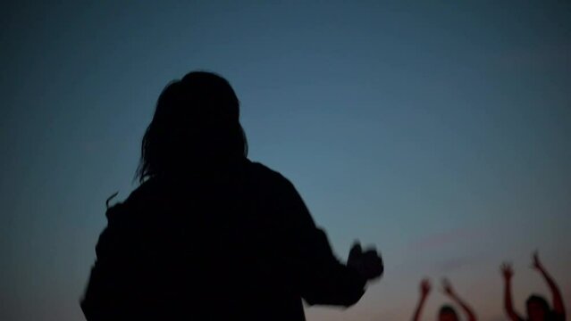 shamanic ritual dances of women at sunset by the campfire