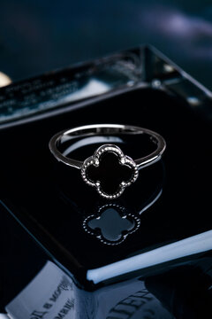  ring with black enamel on black background - Image
