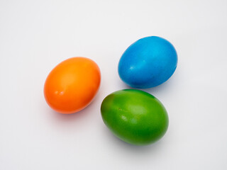 Colored eggs on a white background.