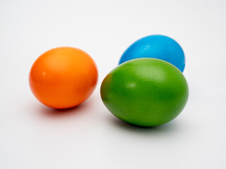 Colored eggs on a white background.