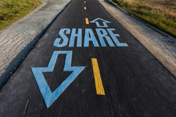 Sign on a California bike path alerting users that bicyclists, walkers, runners need to share the road.