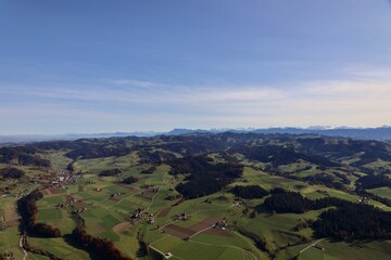 hot air balloon switzerland summer landscape with blue sky and green landscape