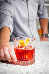 bright colored alcoholic cocktail on a bar background