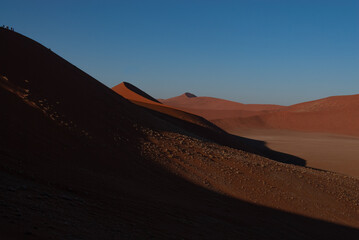 Fototapeta na wymiar The sinuous dunes of Sossusvlei in Namibia