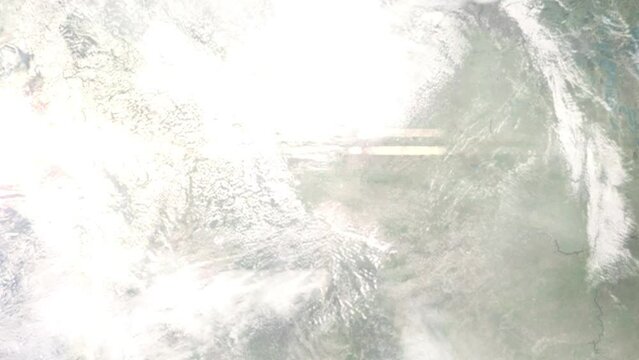 Earth zoom in from outer space to city. Zooming on Lethbridge, Alberta, Canada. The animation continues by zoom out through clouds and atmosphere into space. Images from NASA