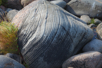 Rocky shore of Baltic sea with stones. Stones textures.