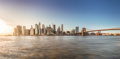 Brooklyn bridge and lower manhattan while sunset