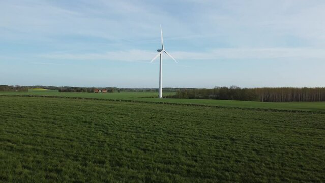 eco-friendly power generation, wind power generator, wind farm standing in a field