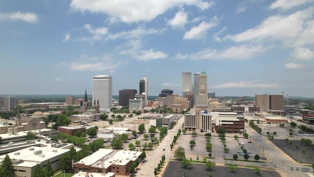 Tulsa Oklahoma Downtown Skyline Blue Sky Clouds Aerial View Orbit Left