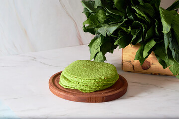 Green tortillas made with spinach, trendy Mexican food.