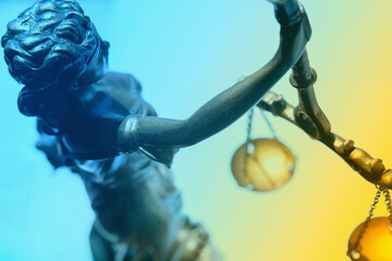 Top view of Lady Justice with scales of truth. Conceptual image of justice, law and legal system. Selective focus. Horizontal image.