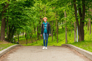Fototapeta premium beautiful girl walking in summer park