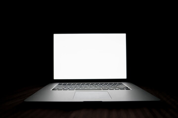 blank laptop in the dark - 505718355