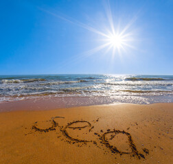 sandy beach with sea sign under sparkle sun, summer sea landscape